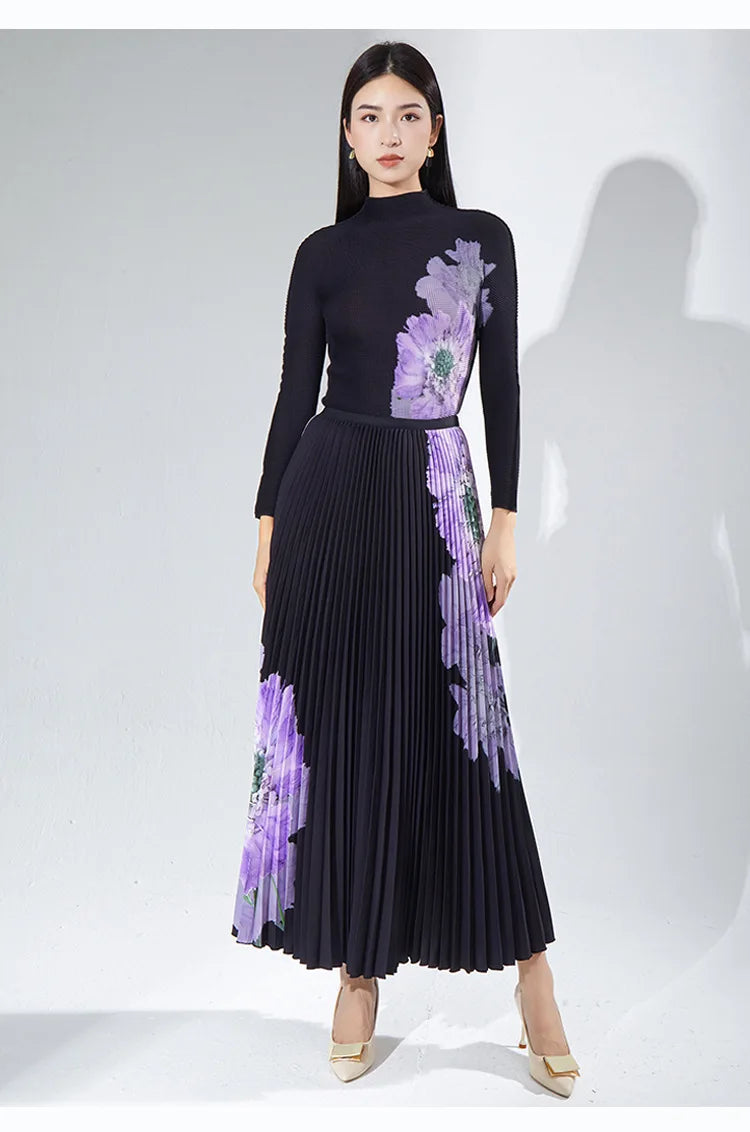 A complete outfit for women, including a long-sleeved t-shirt and a printed pleated skirt – a two-piece set.